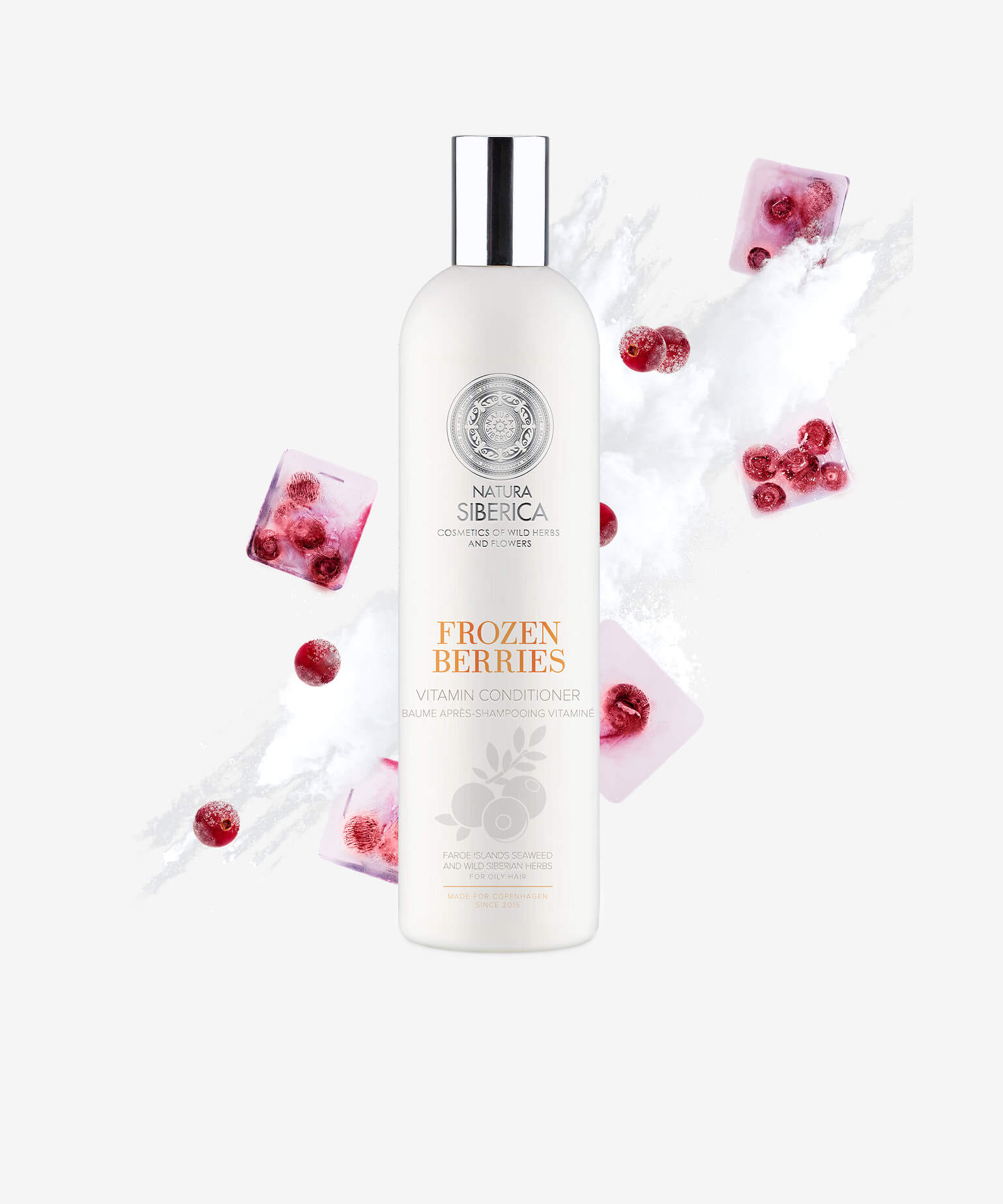 Natura Siberica Frozen Berries shampoo bottle with frozen berries on a white background
